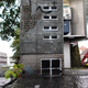Illustration for article titled Artist Converts Everyday Objects Into Super-Realistic Miniature Apartment Buildings